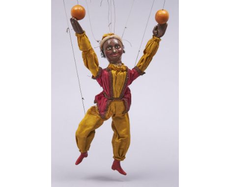 Puppet. A Victorian painted wood music hall ball juggler marionette, c1890, in the form of an eastern man in rich braided and