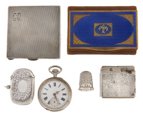 An Edwardian silver vesta case, 45mm, by T Heatley, Birmingham 1905, a silver compact, thimble in leather case, cigarette lig