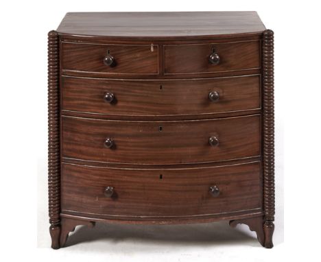 A Victorian bow fronted mahogany&nbsp; chest of drawers, with reel turned pilasters, 91cm h; 54 x 96cm  Minor shrinkage crack