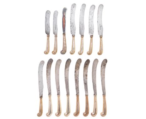 A set of George II silver pistol hafted knives, crested, maker TM, comprising seven table knives, the original scimitar blade