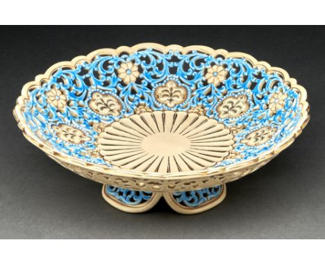A Zsolnay pierced earthenware fruit stand, late 19th c, with chrysanthemum moulded gilt centre and turquoise majolica leafy s
