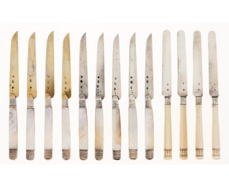 A set of nine French mother of pearl hafted silver gilt dessert knives with gold shield escutcheon, maker DP a, circle above,