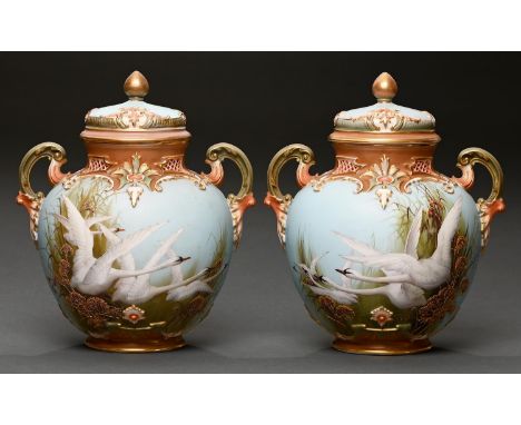 A pair of Royal Worcester scroll handled pot pourri vases and covers, 1899, painted by C Baldwyn, both signed, with swans bef