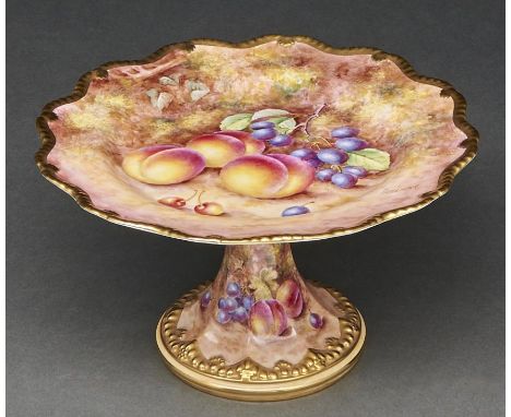 A Royal Worcester fruit painted tazza, c1970, by Freeman, signed, gilt gadrooned rims, 22cm diam, black printed mark  Good co