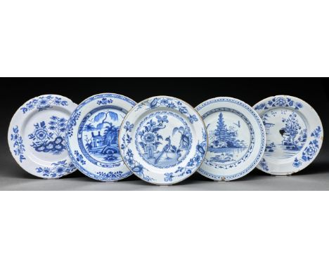 Five English Delftware plates, Lambeth, c1770, variously painted with a comical bird, peony and rock or landscapes, with or w