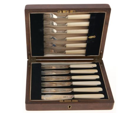 A set of six George VI bone handled silver fish knives and forks, by G W Shirtcliffe &amp; Son, Sheffield 1941, oak case  As 