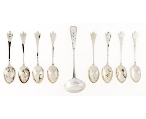 A George III bright cut silver cream ladle, by Solomon Hougham, London 1797 and a set of eight Elizabeth II coffee spoons, tr