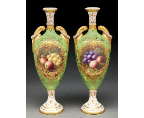 A pair of Coalport vases, 1918-26, painted by F H Chivers, both signed, with fruit in raised gilt frame reserved on an apple 