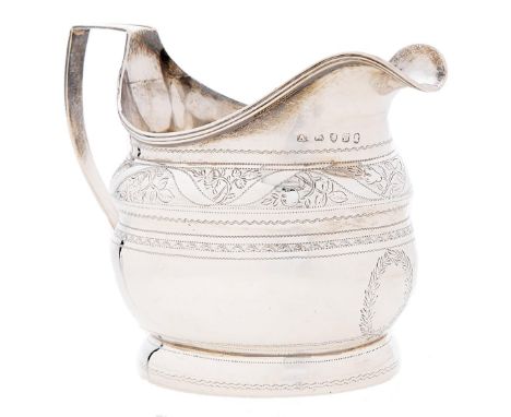 A George III engraved silver cream jug, reeded handle and rim, 10cm h, maker's mark rubbed, A -, London 1801, 4ozs 8dwts  Lig