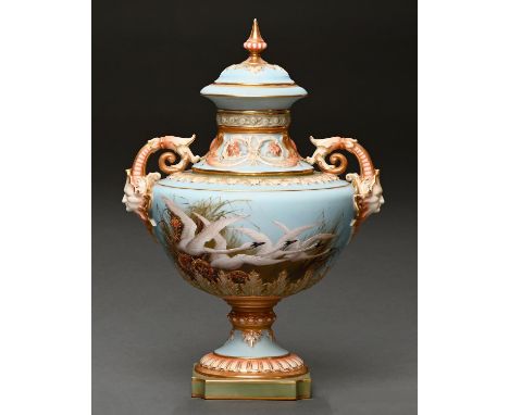 A Royal Worcester vase and cover, 1901, painted by Baldwyn, signed, with swans before green, sepia and raised gilt grasses on