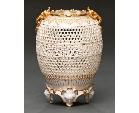 A Royal Worcester reticulated vase by George Owen, 1912, ovoid with gilt grotesque mask-and-ring handles, the shoulder encirc