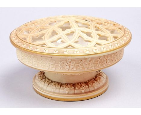 A Royal Worcester gothic pot pourri bowl and cover, 1909, in shaded apricot, rims gilt, cover 14.5cm diam, green printed mark