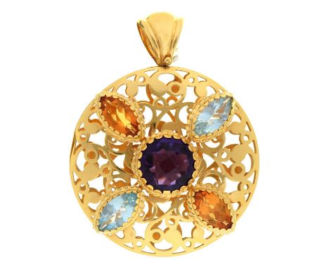 An amethyst, citrine and blue topaz openwork pendant, in silver gilt, 48mm diam, marked EMOZIONI and 750, 20g  Good condition