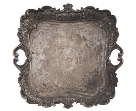 An Edwardian silver&nbsp; tray, shaped square, foliate engraved within chased border and C and S scroll rim, 27.5cm over hand