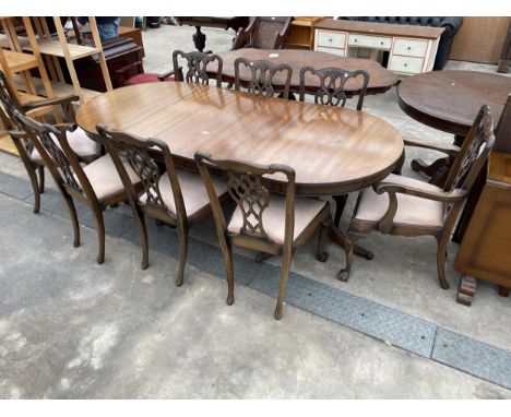 A SET OF EIGHT MAHOGANY CHIPPENDALE STYLE DINING CHAIRS, TWO BEING CARVERS AND TWIN PEDESTAL DINING TABLE 