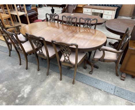 A SET OF EIGHT MAHOGANY CHIPPENDALE STYLE DINING CHAIRS, TWO BEING CARVERS AND TWIN PEDESTAL DINING TABLE 