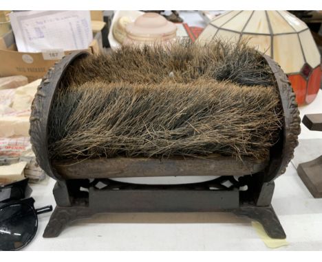 A VINTAGE CAST BOOT BRUSH IN THE SHAPE OF A HEDGEHOG 