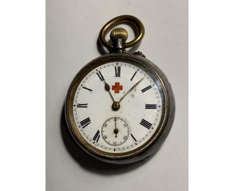A LADIES RED CROSS POCKET WATCH WITH WHITE ENAMEL FACE AND ROMAN NUMERALS SEEN WORKING BUT NO WARRANTY 