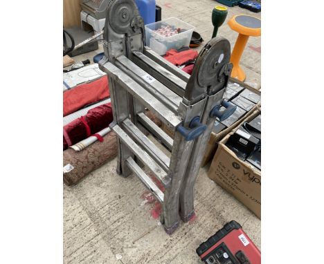 AN ALUMINIUM MULTIFUNCTIONAL FOLDING LADDER 