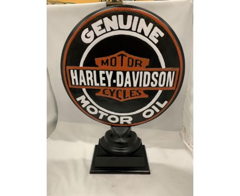 A LARGE CONVEX STEEL HARLEY DAVIDSON MOTOR OIL SIGN ON PEDESTAL, 21" HIGH 