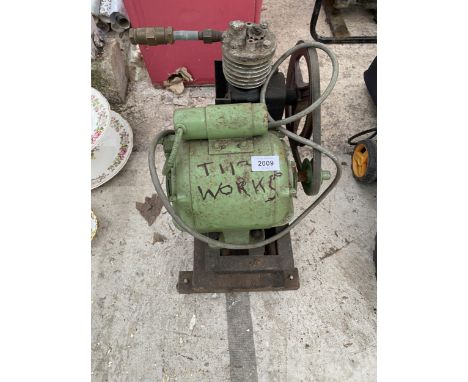 A VINTAGE ENGINE WITH COMPRESSOR 