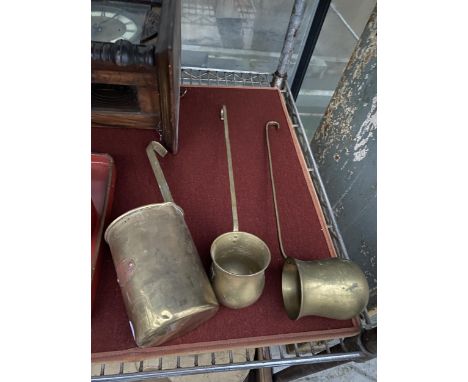 THREE VINTAGE BRASS SPIRIT MEASURING CUPS 