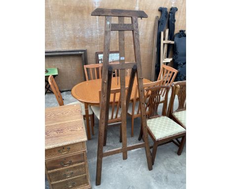AN EARLY 20TH CENTURY OAK EASEL, 73" HIGH AND 30" WIDE 