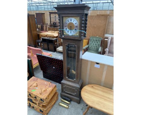 AN OAK CASED DOUBLE WEIGHT LONGCASE CLOCK WITH GLASS DOOR AND BOBBIN TURNED UPRIGHTS 