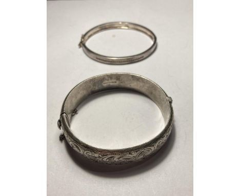 TWO SILVER BANGLES 