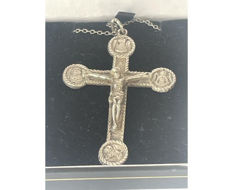 A CONTINENTAL SILVER CROSS AND CHAIN 