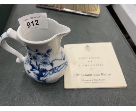 A ROYAL WORCESTER FOR COMPTON WOODHOUSE SMALL BLUE AND WHITE JUG WITH CERTIFICATE 