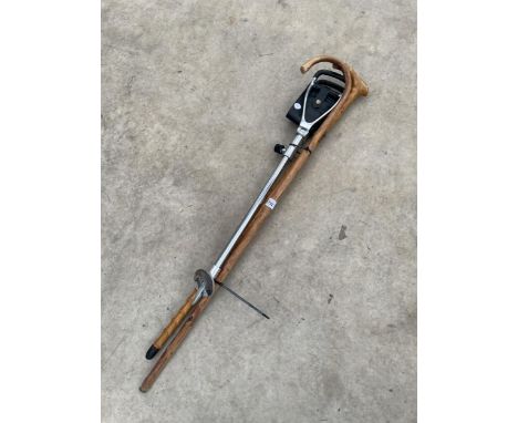 TWO WOODEN WALKING STICKS AND A SHOOTING STICK SEAT 