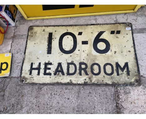 A VINTAGE TIN 10' 6" HEADROOM SIGN 