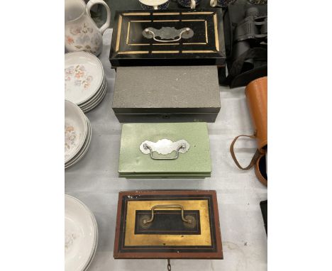 A GROUP OF FOUR VINTAGE CASH TINS 