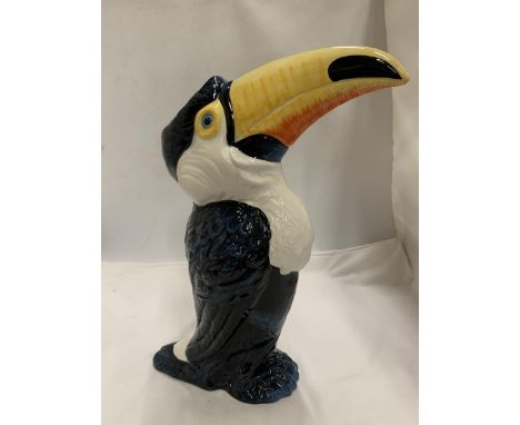 A DRAGONFLY JACK GRAHAM DESIGN TOUCAN FIGURE 