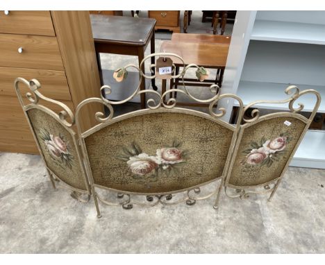 A WROUGHT IRON THREE DIVISION FIRESCREEN 