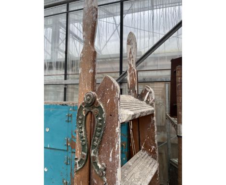 A VINTAGE WOODEN SEVEN RUNG STEP LADDER 