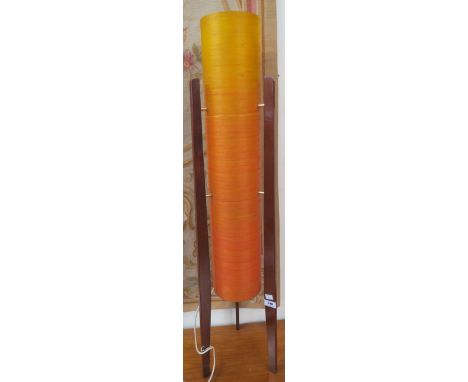 A Mid Century Rocket lamp with orange shade 106cm high Condition Report: Lamp is in good general condition consummate with it