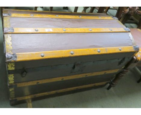 A saratoga trunk, 56cm high x 84cm wide x 48cm deep Condition Report: Available upon request