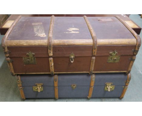 A wood bound travel trunk and a grey wood bound travel trunk (both with keys) Condition Report: Available upon request