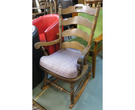 A ladder back rocking chair Condition Report: Available upon request