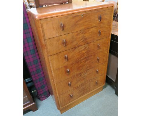 A walnut Art Deco chest with six graduating drawers, 123cm high x 76cm wide x 57cm deep Condition Report: Chest shows signs o