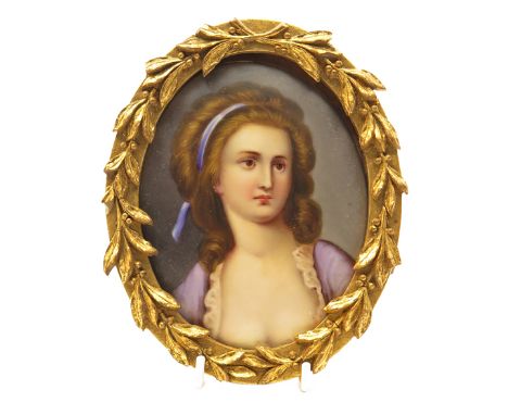 λ Continental School 19th Century Portrait miniature of a lady, head and shoulders Oval in a leaf and berry gilt frame 80 x 6