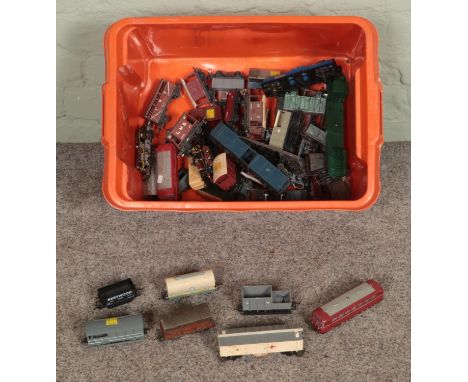 A box of Tri-Ang and Marklin OO Gauge rolling stock to include carriages, tankers, wagons, etc.  