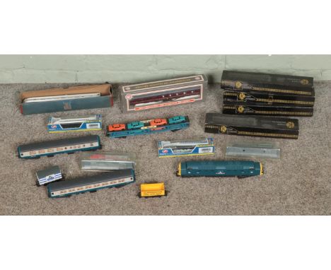 A collection of mostly boxed model railway rolling stock to include Lima, Kasiner Hobbies, Dapol, Japanese Shinkansen, etc.  