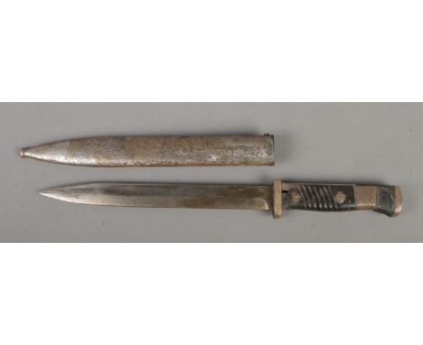 A German World War Two K98 bayonet with scabbard. Blade length 24.5cm. CANNOT POST OVERSEAS  