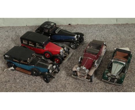 Five boxed Franklin Mint Precision Models. Includes 1929 Rolls Royce Phantom I, The 1930 Bugatti Royale Coupe Napoleon, 1935 