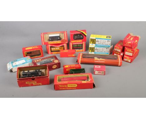 A collection of boxed model railway carriages and accessories to include Hornby, Tri-Ang, Peco, Hornby Dublo, etc.  