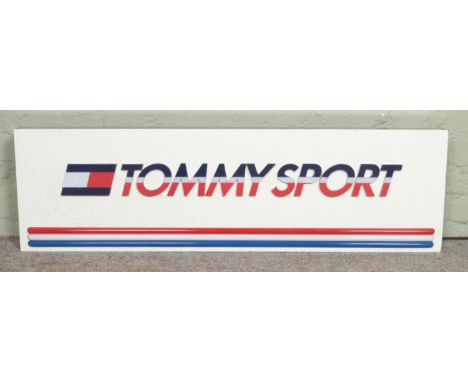A shop advertising lighting sign for 'Tommy Sport'; Tommy Hilfiger. 121cm long.  In working order.