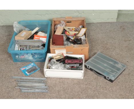 Two boxes of model railway spares and repairs to include motors, cable, track, etc.  